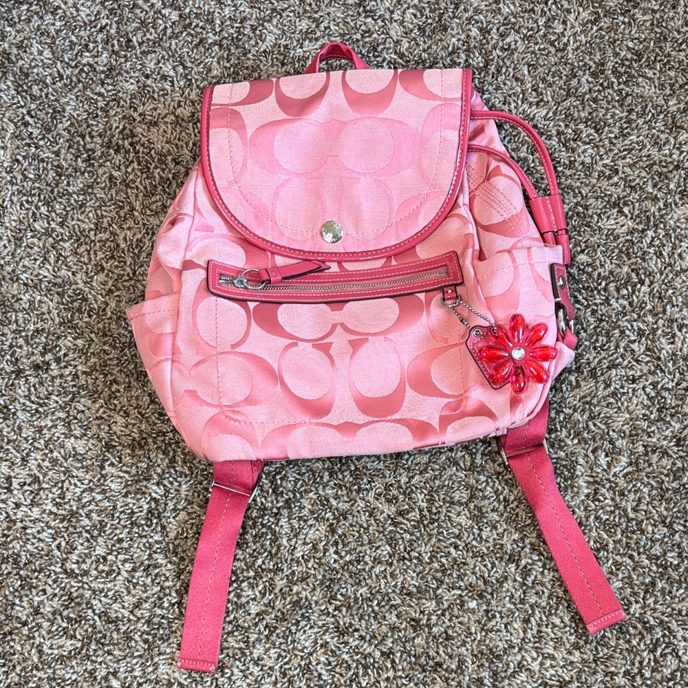 Coach Kyra Daisy signature backpack in Pink.